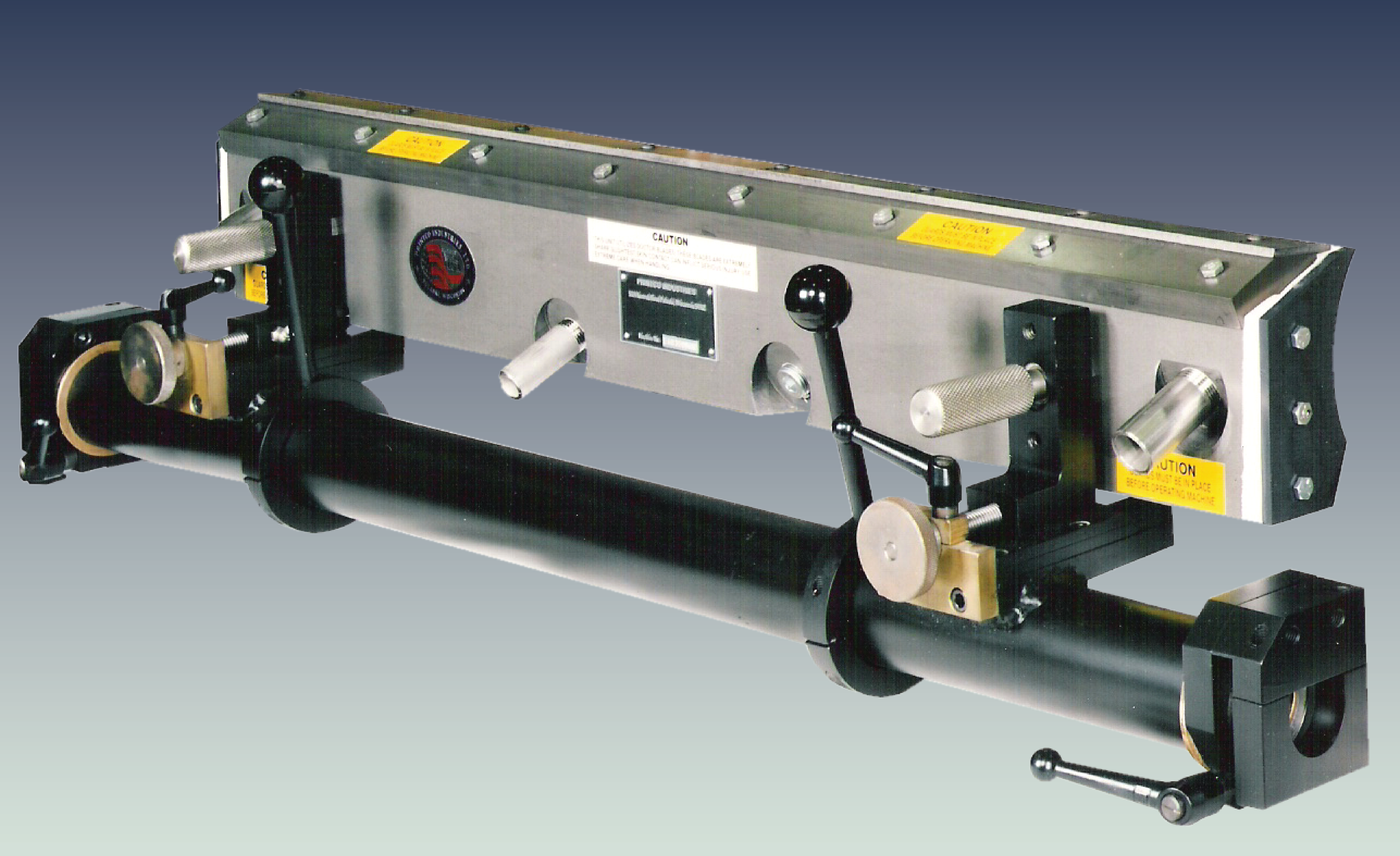 doctor blade system, adhesive applicator head with linear adjustment
